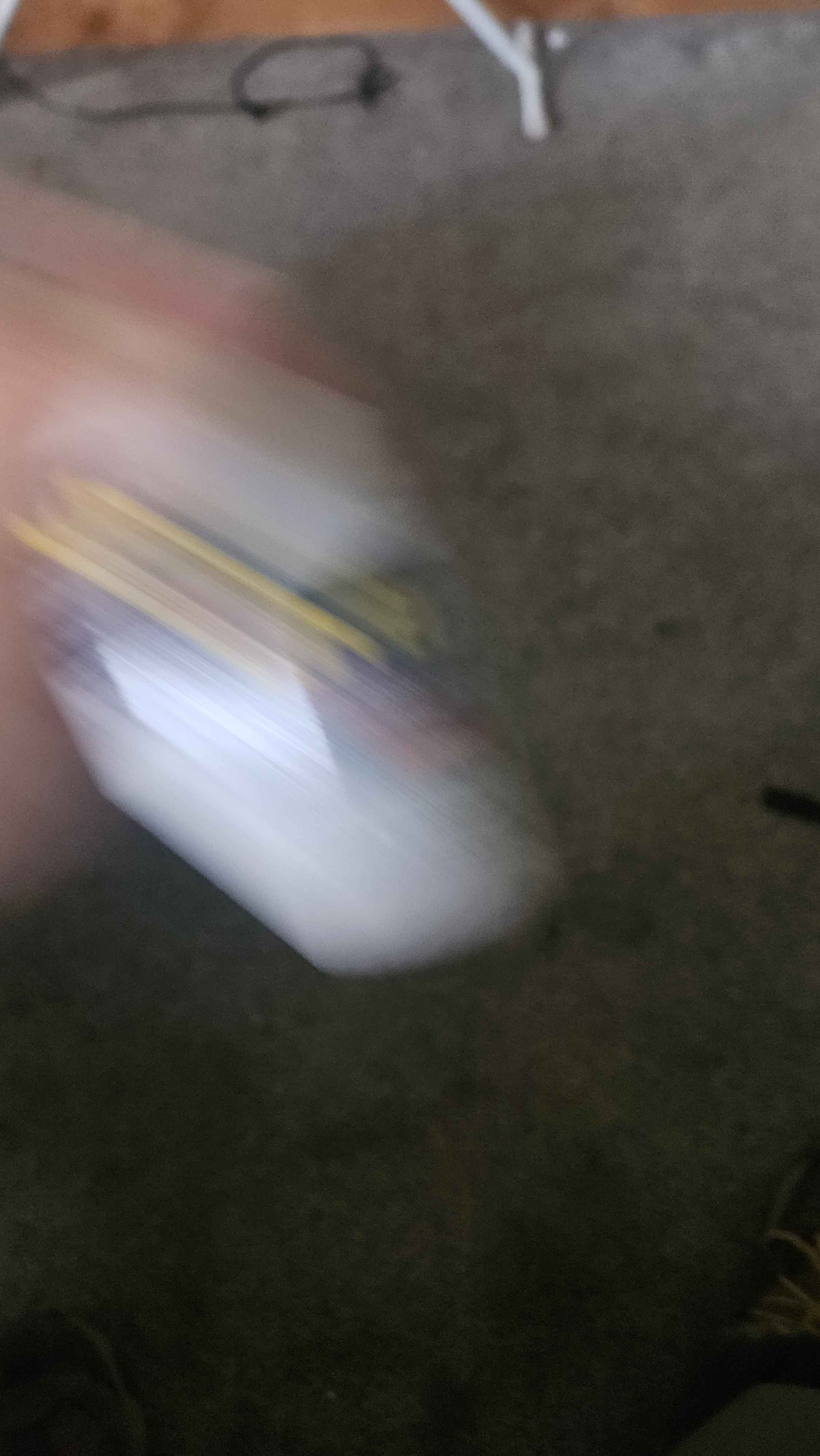 A blurry photo of a generic tylnol bottle